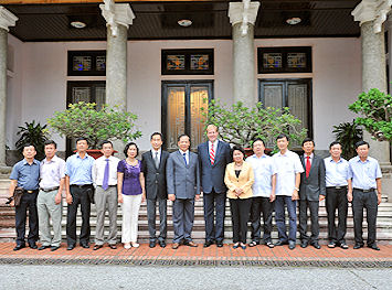 The delegation from Canada meeting with members of the Hai Duong province legislature in fall 2012 at a special meeting to discuss the hospital project considered for at Di An Industrial zone in Hai Duong province.  Pictured beside Marc Kealey (centre) to the right are Madame Phuong, Chair of Dai An JSC and partner to Triple Eye Corp